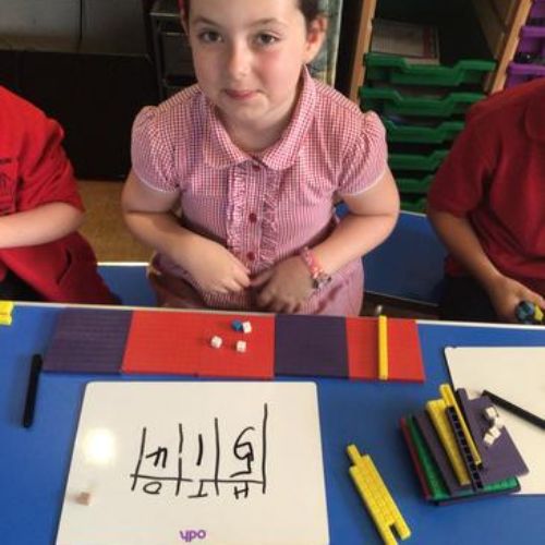 We have been using base 10 and place value counters to represent numbers in maths.