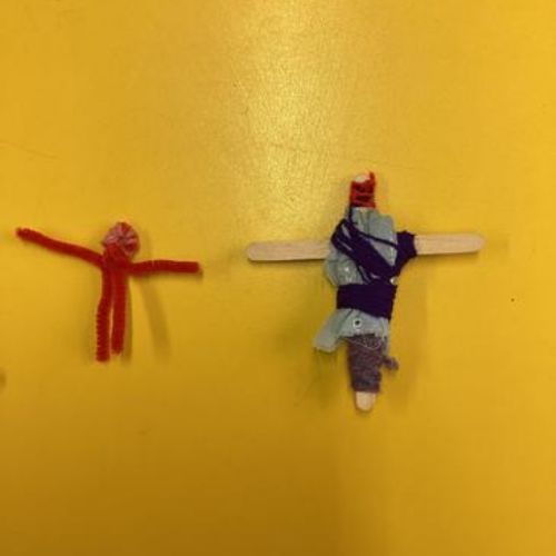 Guatemalan inspired worry people using pipe cleaners, sticks, wool and fabric.